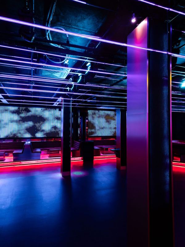 Hands in the air on the dance floor at DPRTMNT nightclub Toronto