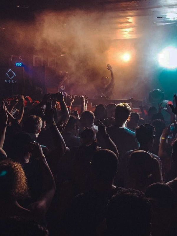 DJ facing a huge crowd at Nest nightclub on College Street Toronto